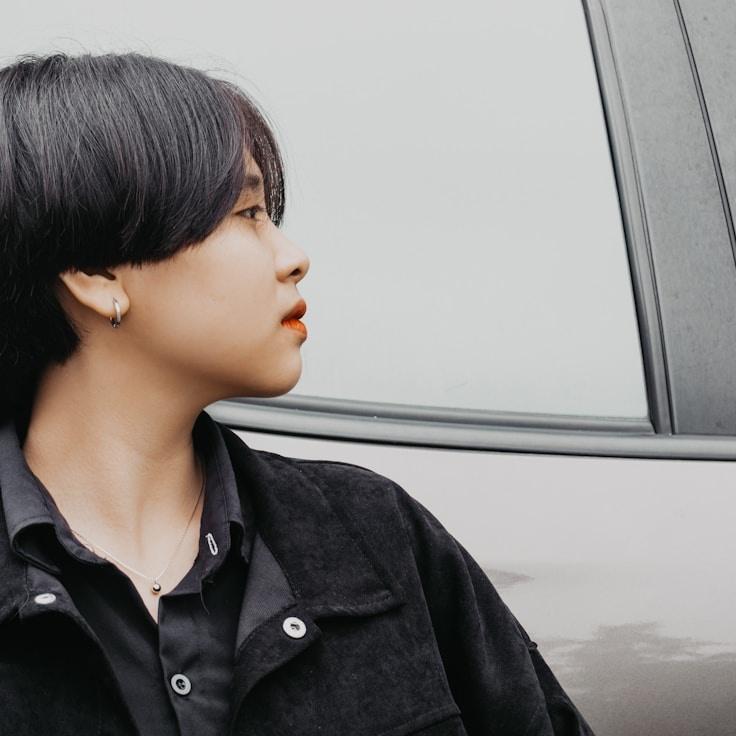 Portrait of Riley Chen, group coordinator and fusion cooking expert